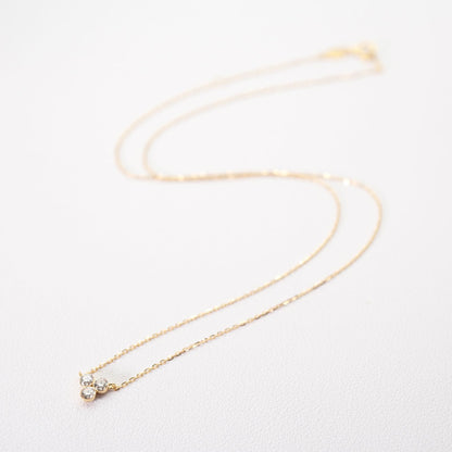 Agete K18 3-P diamond necklace featuring 0.15 carats diamonds on a delicate gold chain