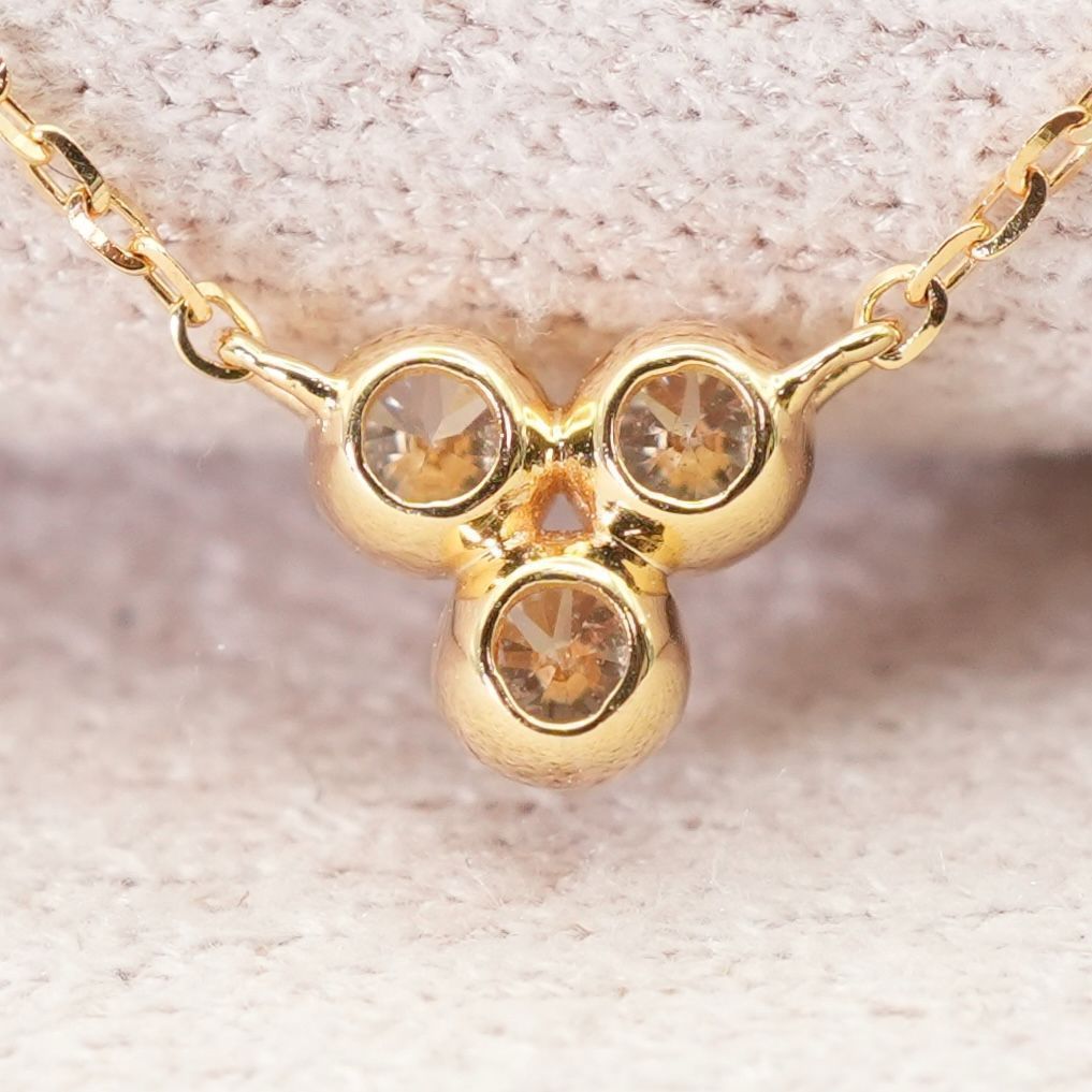 Agete K18 3-P diamond necklace featuring 0.15 carats diamonds on a delicate gold chain