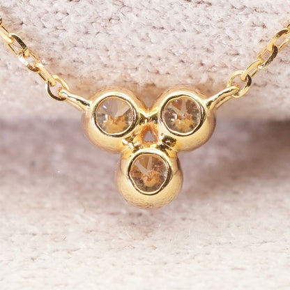 Agete K18 3-P diamond necklace featuring 0.15 carats diamonds on a delicate gold chain