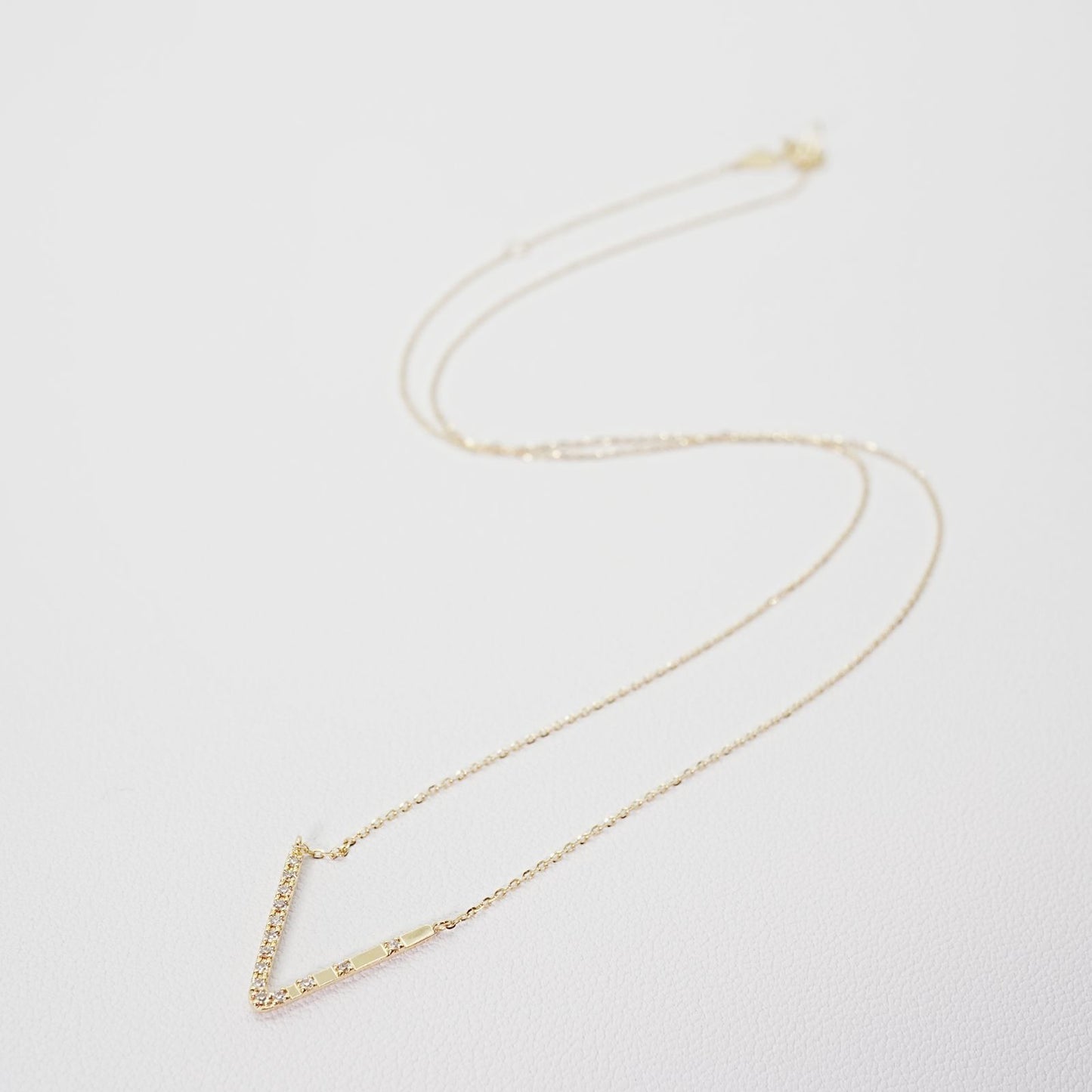 Agete K18 V Line Diamond Necklace 25-1402S featuring 0.04ct diamonds on a refined V line design
