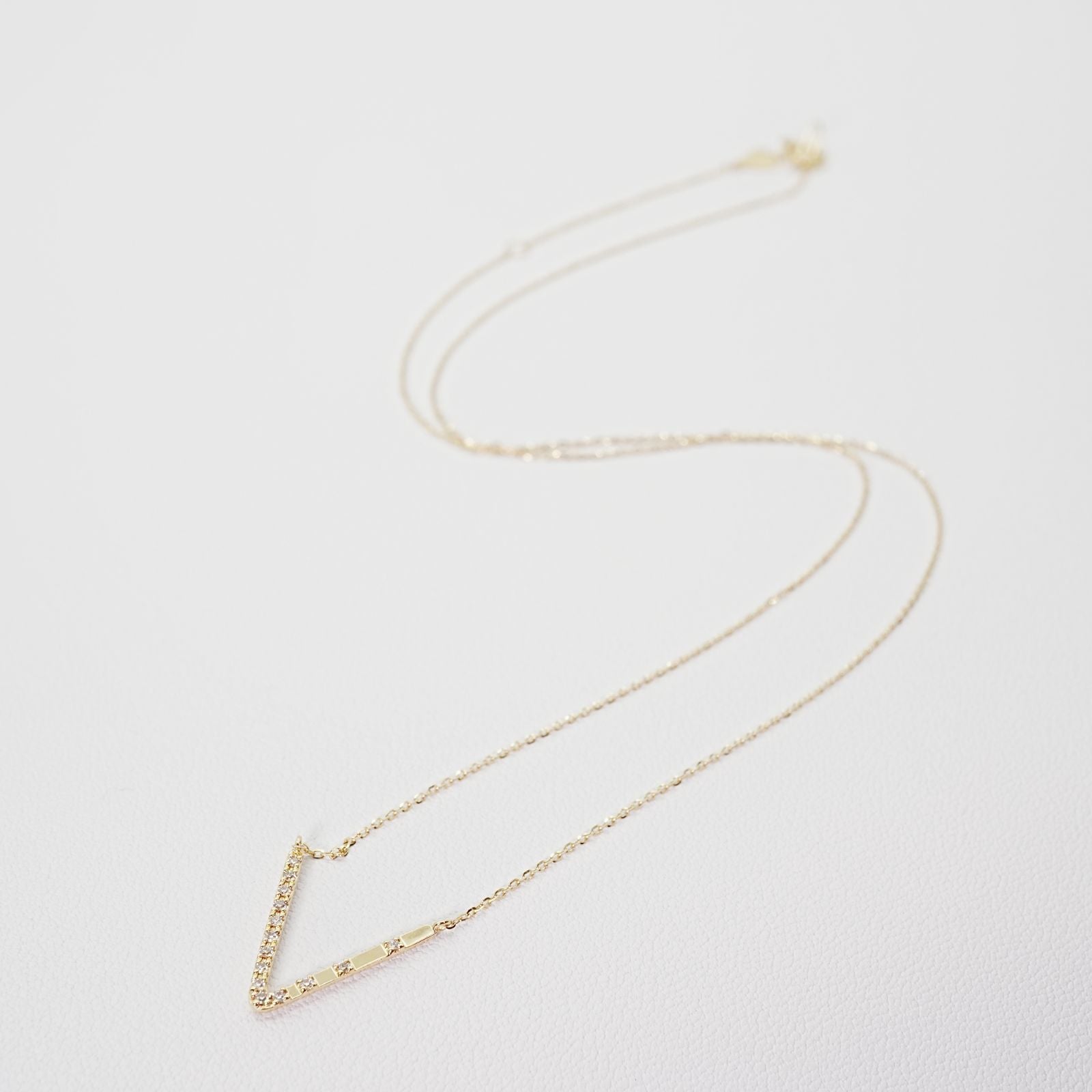 Agete K18 V Line Diamond Necklace 25-1402S featuring 0.04ct diamonds on a refined V line design