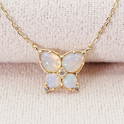 Agaat butterfly necklace with K14 gold, opal stone, and small diamond on delicate chain