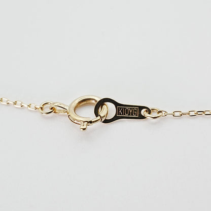 Agaat butterfly necklace with K14 gold, opal stone, and small diamond on delicate chain