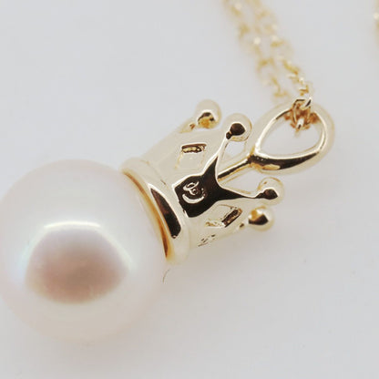 Tasaki pearl necklace featuring 7.4mm pearls on 18K yellow gold chain, 38-41.5cm length