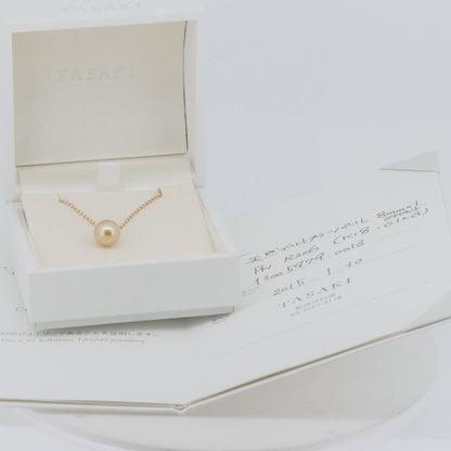 Tasaki Law gold necklace featuring an 8.8mm golden pearl and 0.12ct diamond on an 18K yellow gold chain