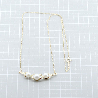 Mikimoto pearl necklace with 4.8mm to 5.9mm pearls set in 18K yellow gold chain