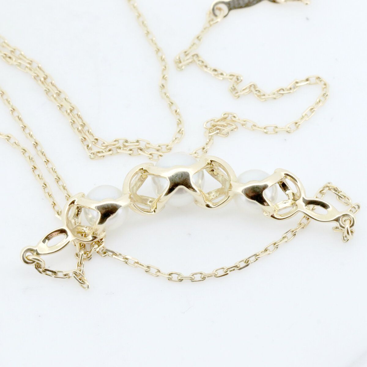 Mikimoto pearl necklace with 4.8mm to 5.9mm pearls set in 18K yellow gold chain