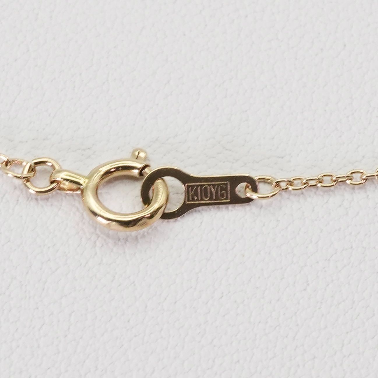 Agete K10 gold necklace with 0.02ct diamond pendant model 24-3286 on white background