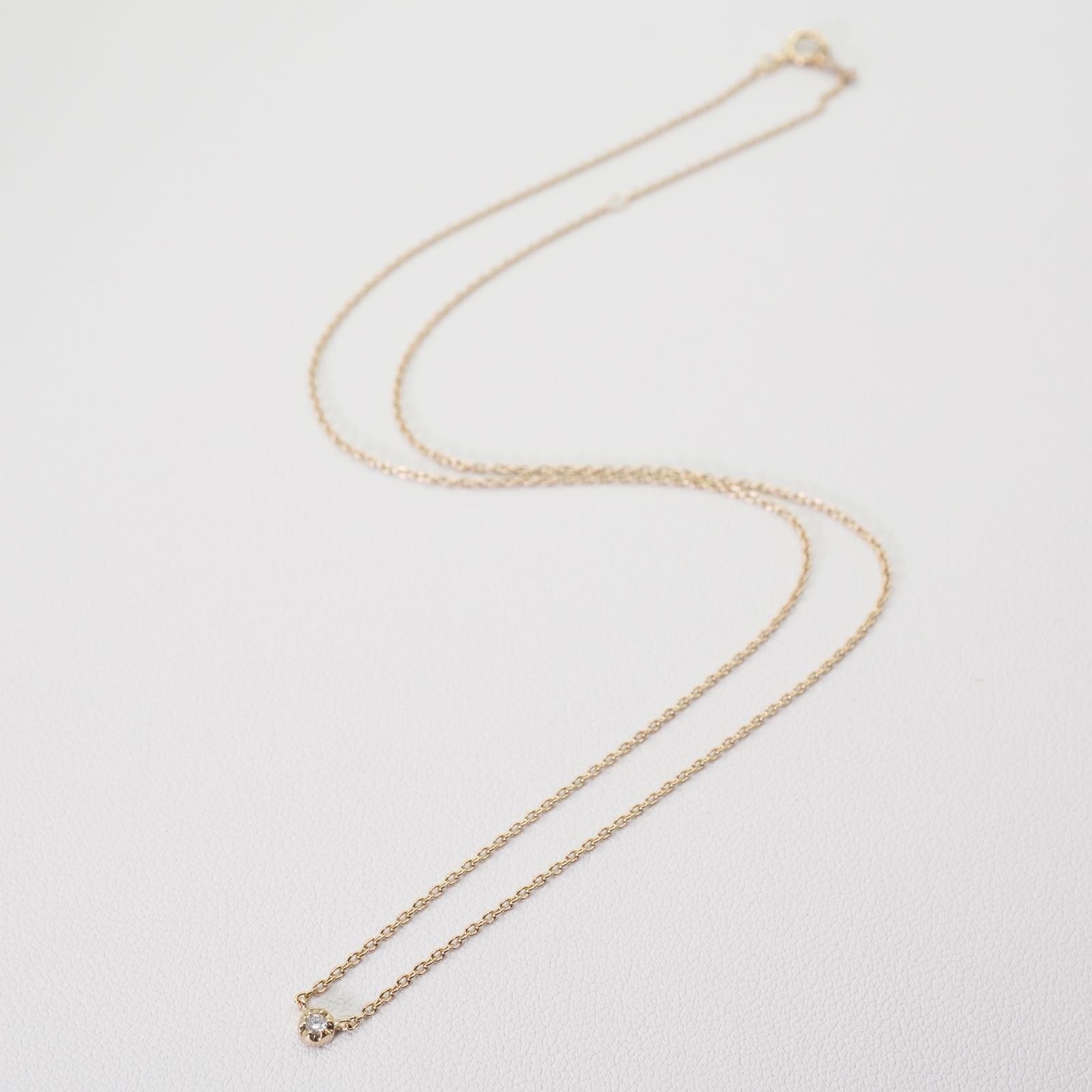 Agete K10 gold necklace with 0.02ct diamond pendant model 24-3286 on white background