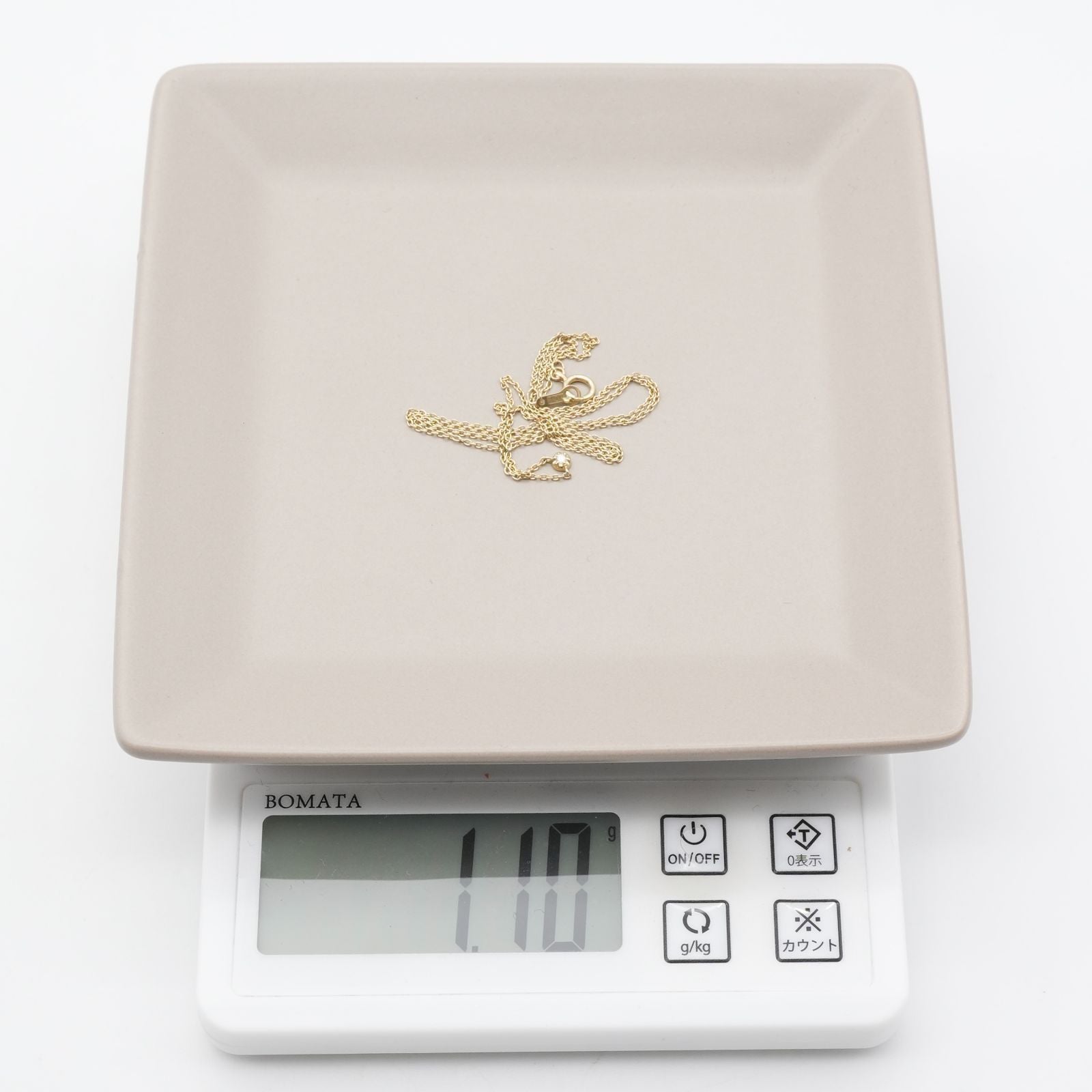 Agete K10 gold necklace with 0.02ct diamond pendant model 24-3286 on white background
