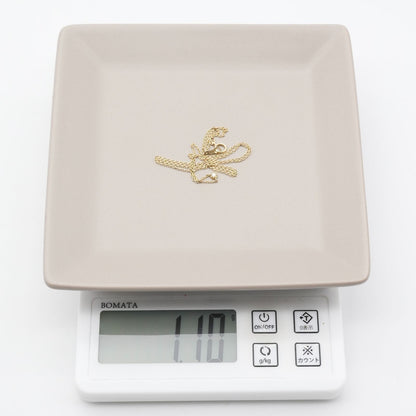 Agete K10 gold necklace with 0.02ct diamond pendant model 24-3286 on white background