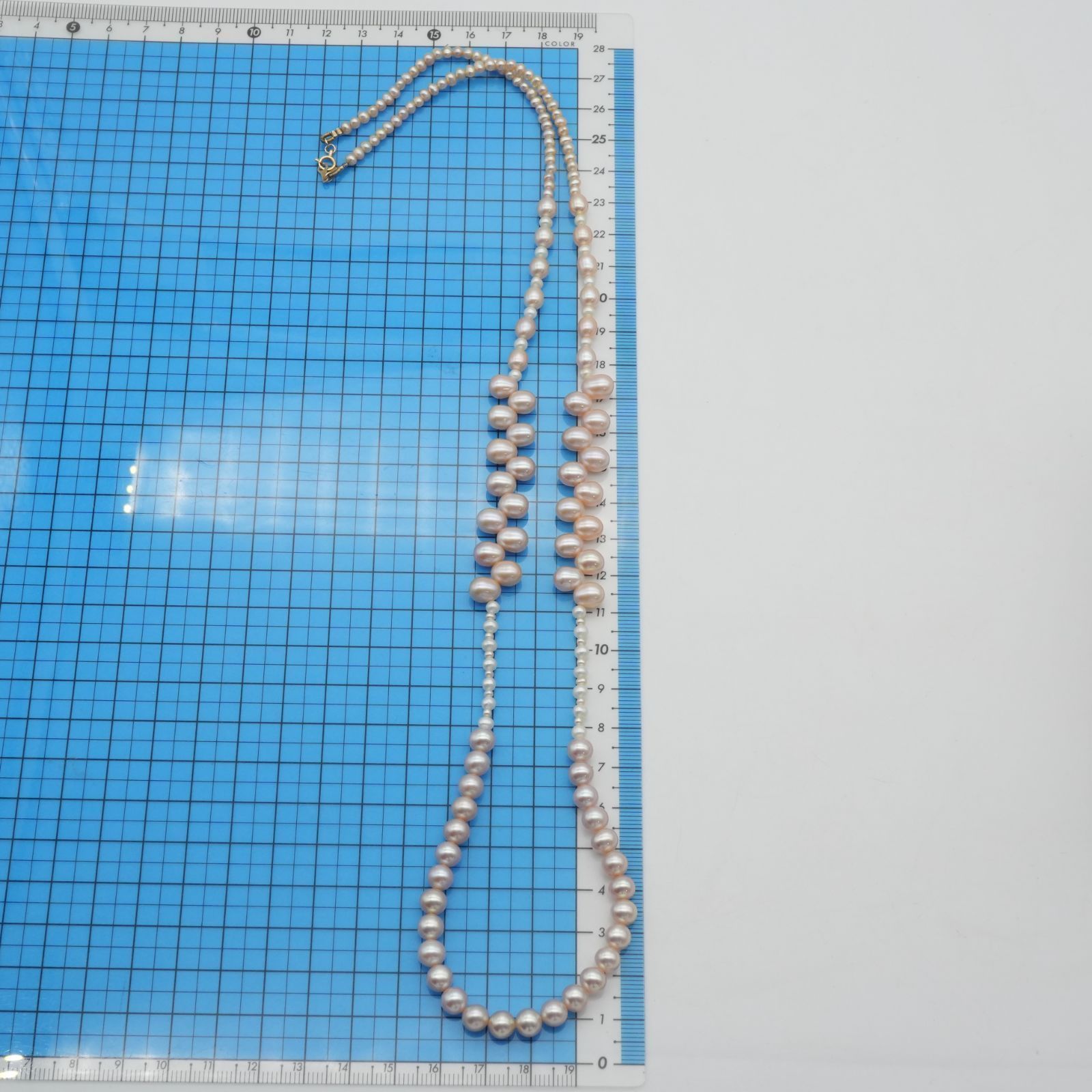 Agete K10 gold long necklace featuring pink freshwater pearls displayed on white background