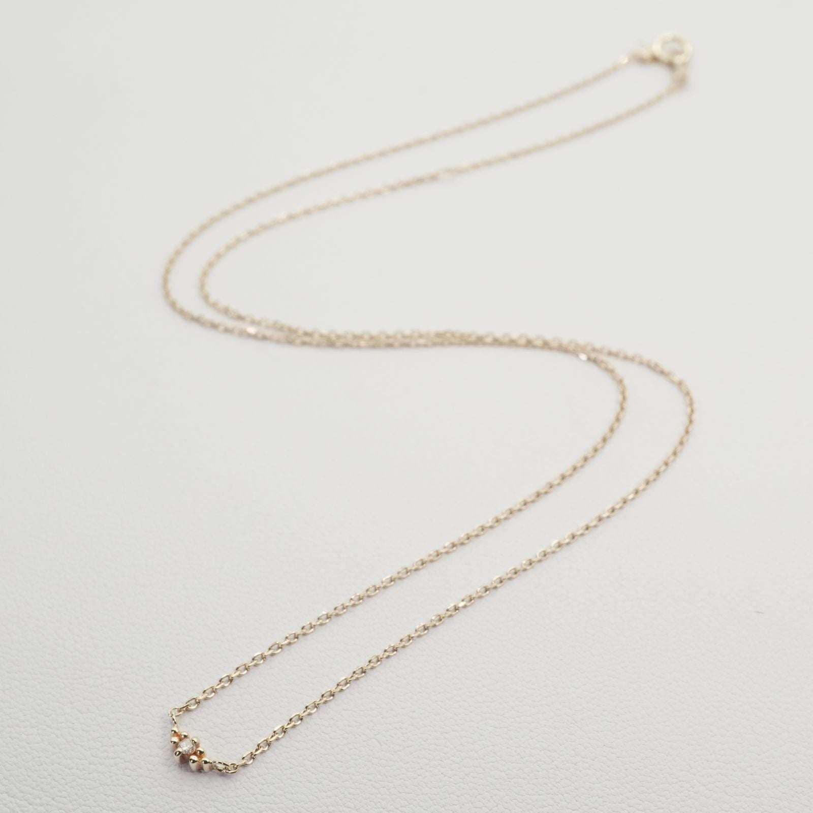Agate K10 Diamond Necklace featuring polished K10 metal and sparkling diamonds on a delicate chain