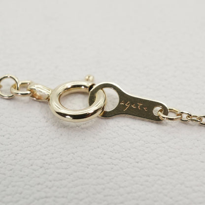 Agate K10 Diamond Necklace featuring polished K10 metal and sparkling diamonds on a delicate chain