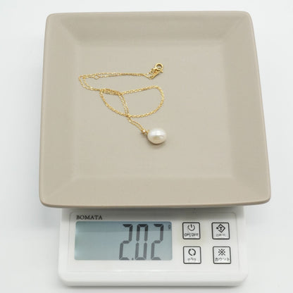 Agate K18 gold necklace pendant with diamond and freshwater pearl on a white background
