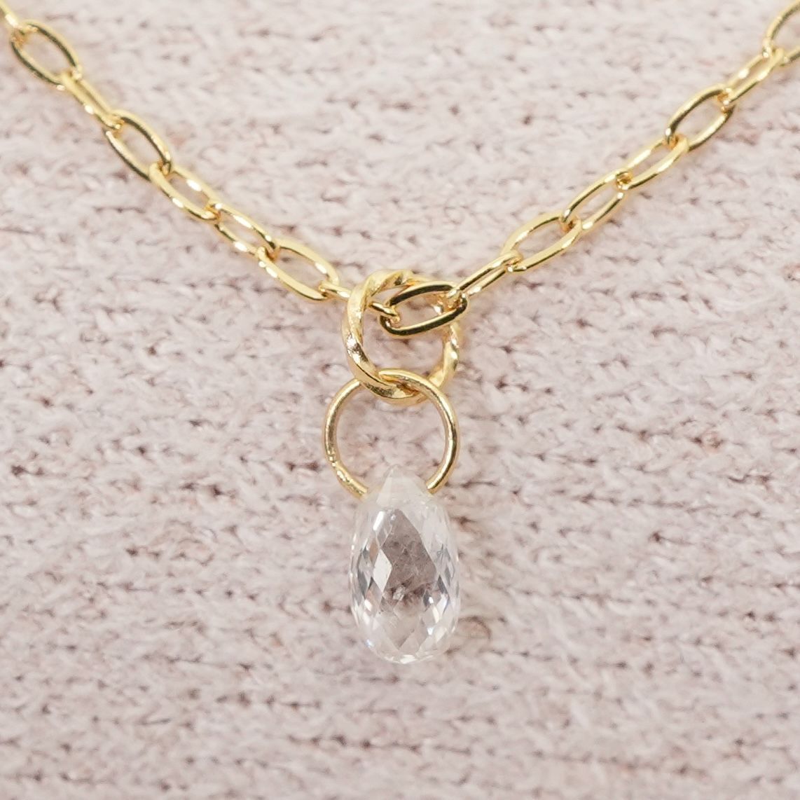 Agete K18 gold necklace with laser hole diamond pendant model 25-3160 displayed on white background