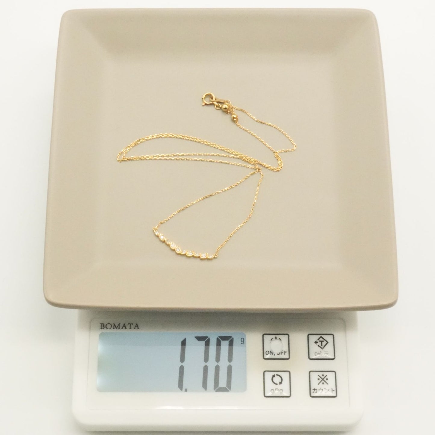 Agate K18 Diamond V Line Necklace 24-4403 with 0.12ct diamonds on a white background