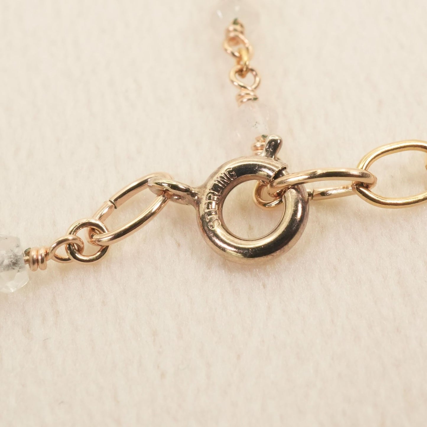 Agete long necklace made of silver with a labradorite stone pendant