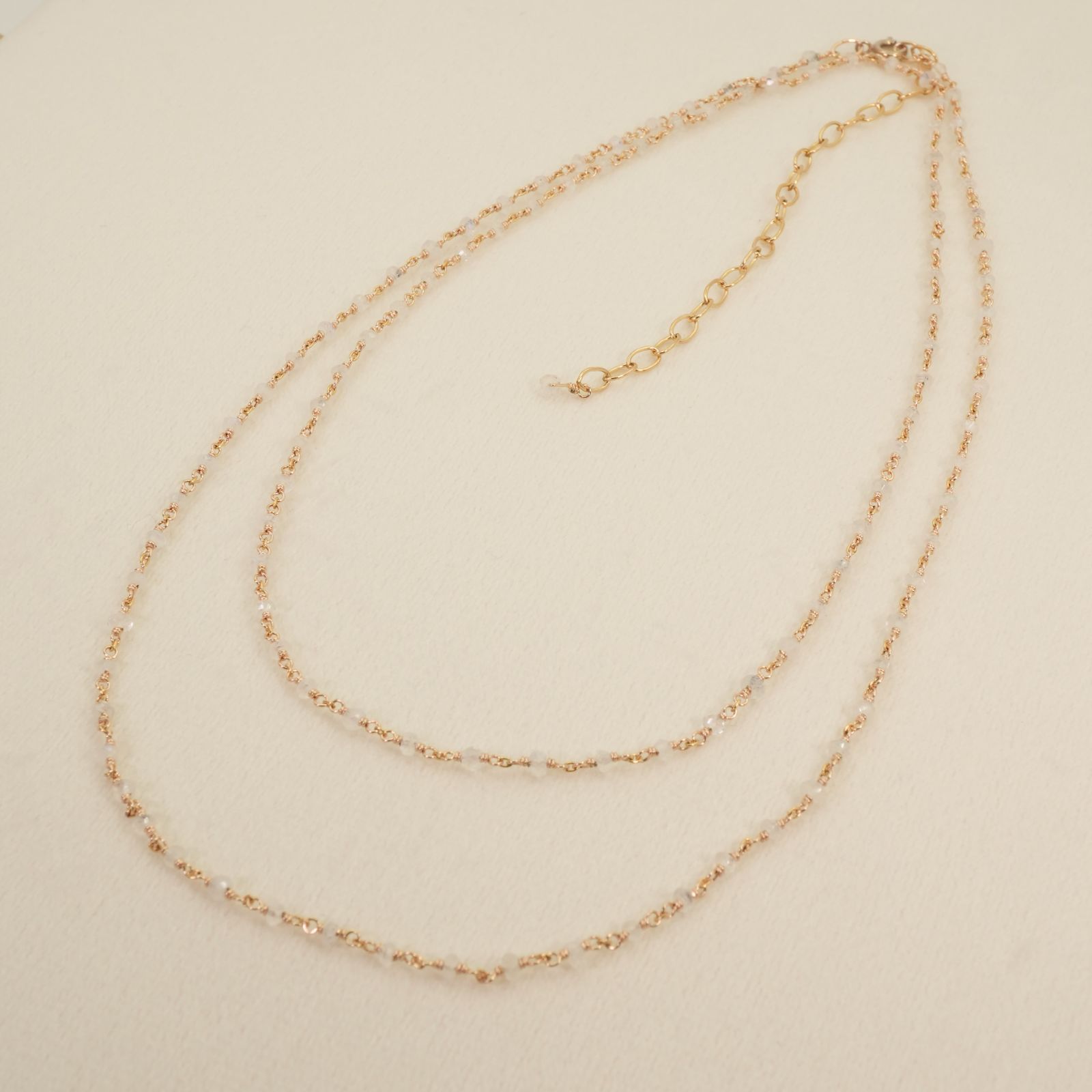 Agete long necklace made of silver with a labradorite stone pendant