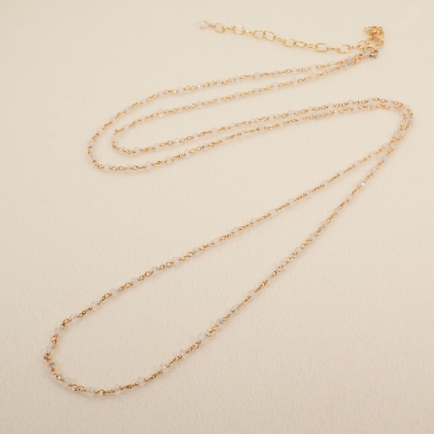 Agete long necklace made of silver with a labradorite stone pendant