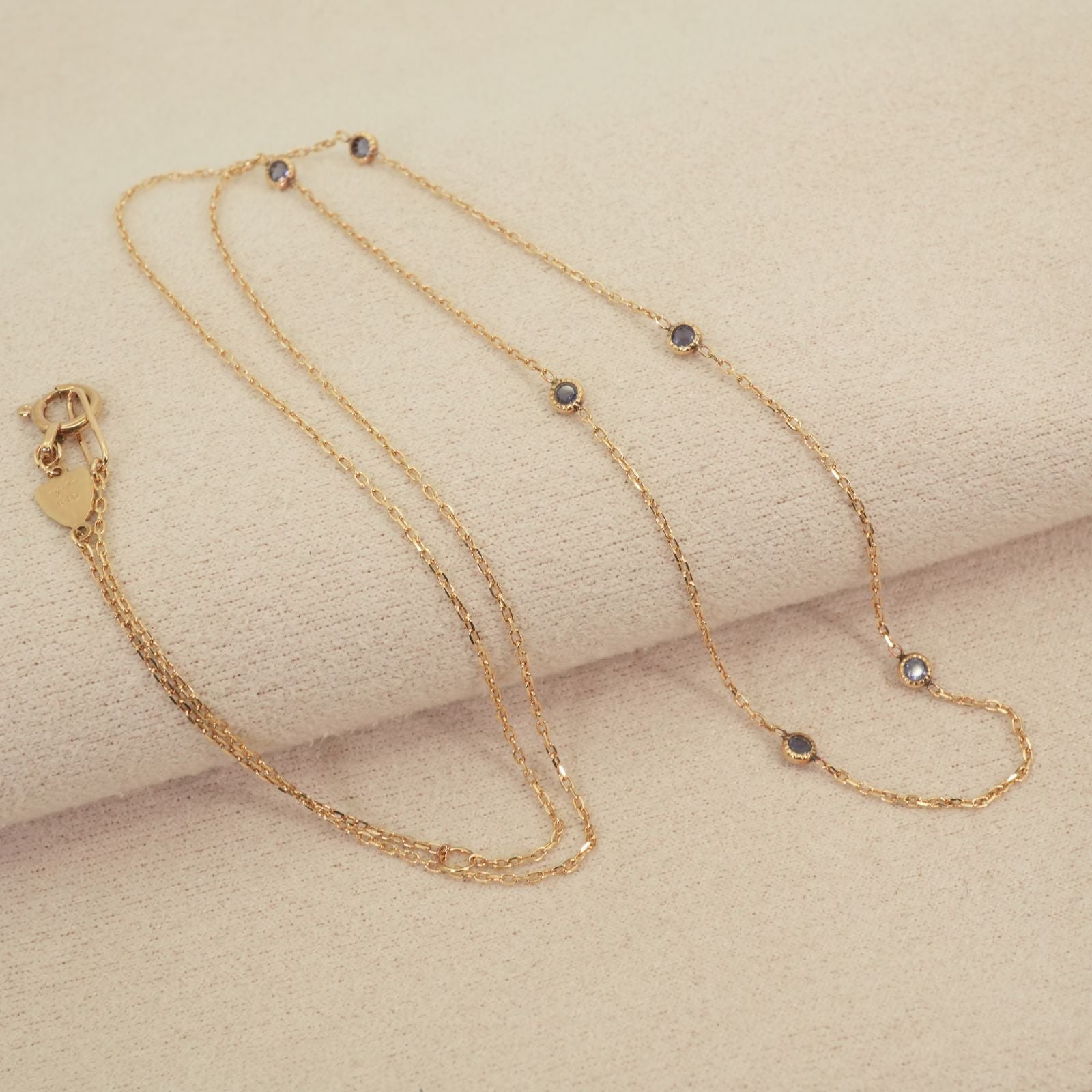 Agete Dreamy Sapphire Station Necklace 26-0797 featuring K10 gold and sapphire stones