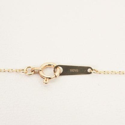 Agete K10 gold necklace chain laid out showing its fine links and polished finish
