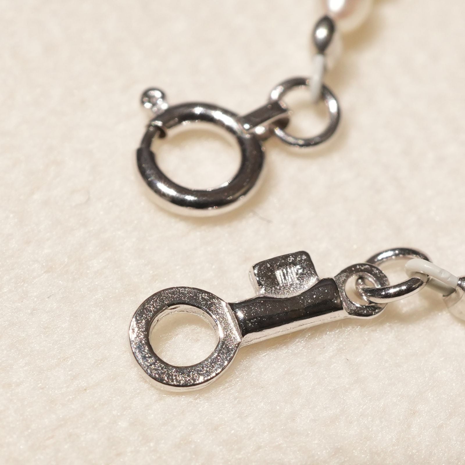 Mikimoto pearl pendant necklace with 18K white gold chain and silver pearl top, model 25-3060