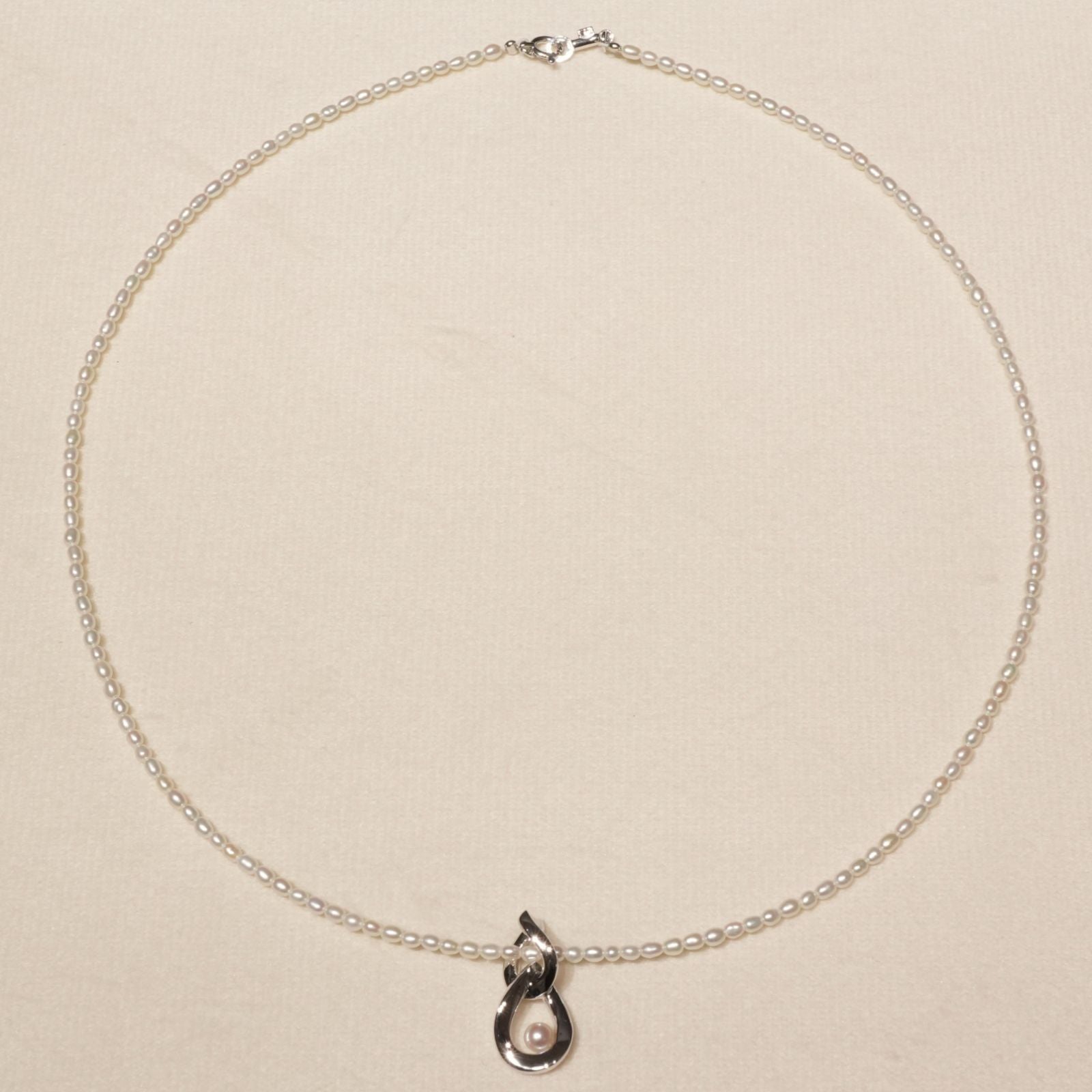 Mikimoto pearl pendant necklace with 18K white gold chain and silver pearl top, model 25-3060