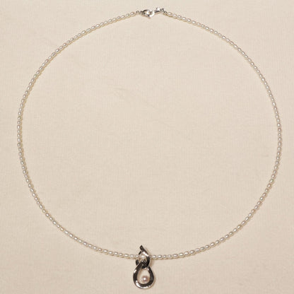 Mikimoto pearl pendant necklace with 18K white gold chain and silver pearl top, model 25-3060
