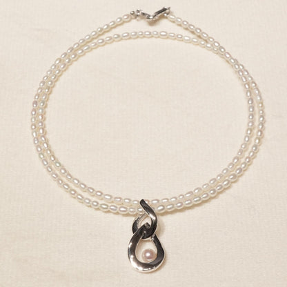 Mikimoto pearl pendant necklace with 18K white gold chain and silver pearl top, model 25-3060