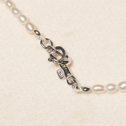 Mikimoto pearl pendant necklace with 18K white gold chain and silver pearl top, model 25-3060