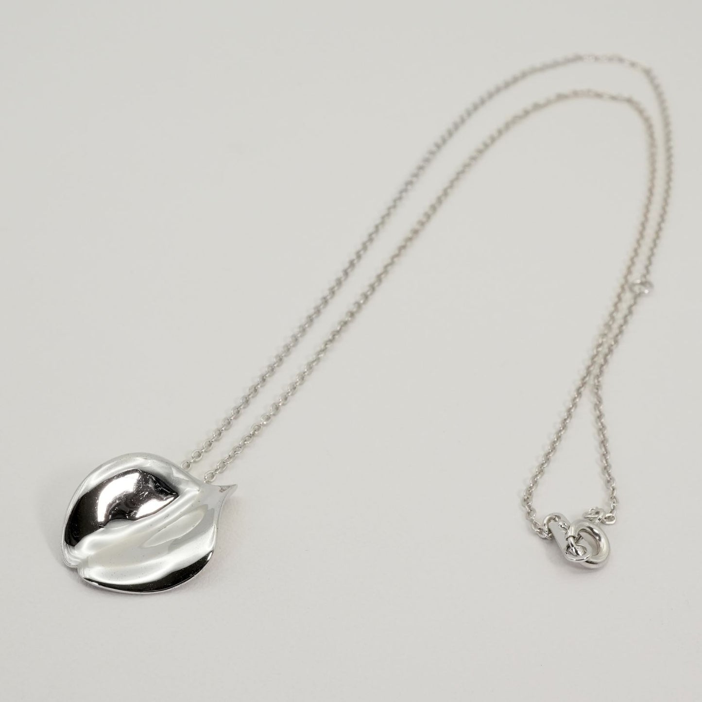 Mikimoto Petal Necklace featuring a Vandome silver pendant on a delicate chain