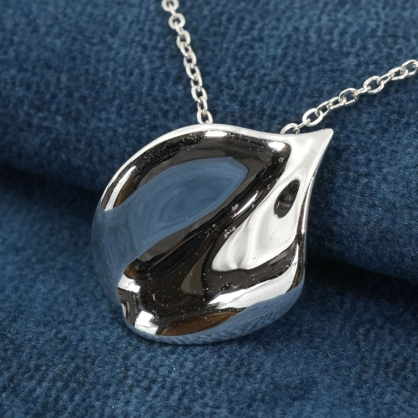 Mikimoto Petal Necklace featuring a Vandome silver pendant on a delicate chain