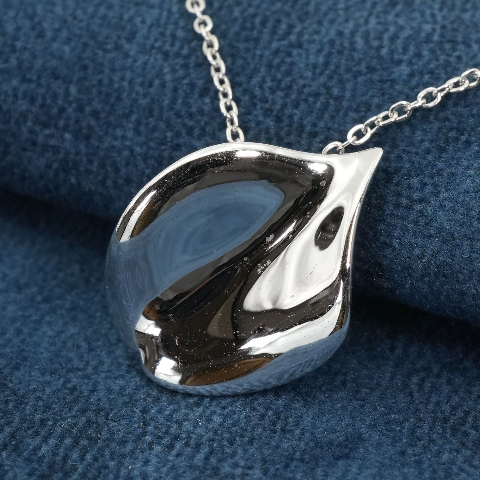 Mikimoto Petal Necklace featuring a Vandome silver pendant on a delicate chain