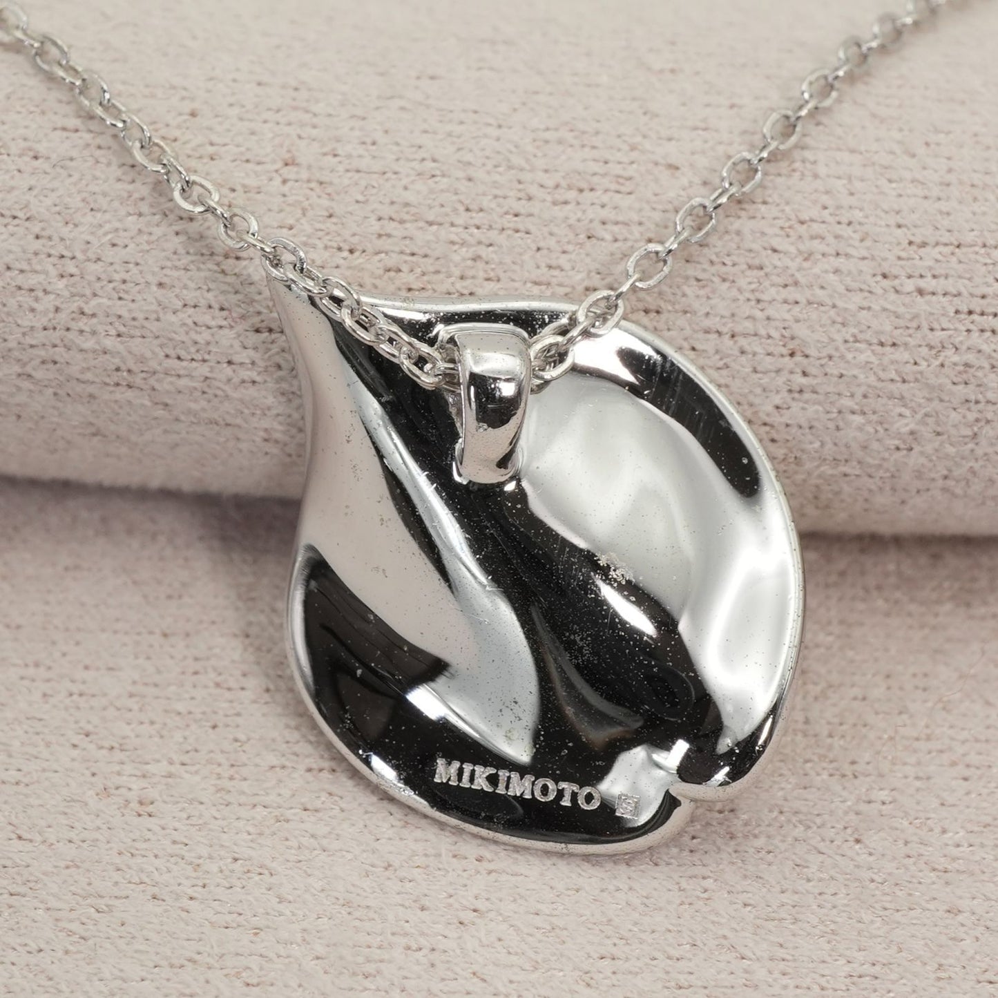 Mikimoto Petal Necklace featuring a Vandome silver pendant on a delicate chain