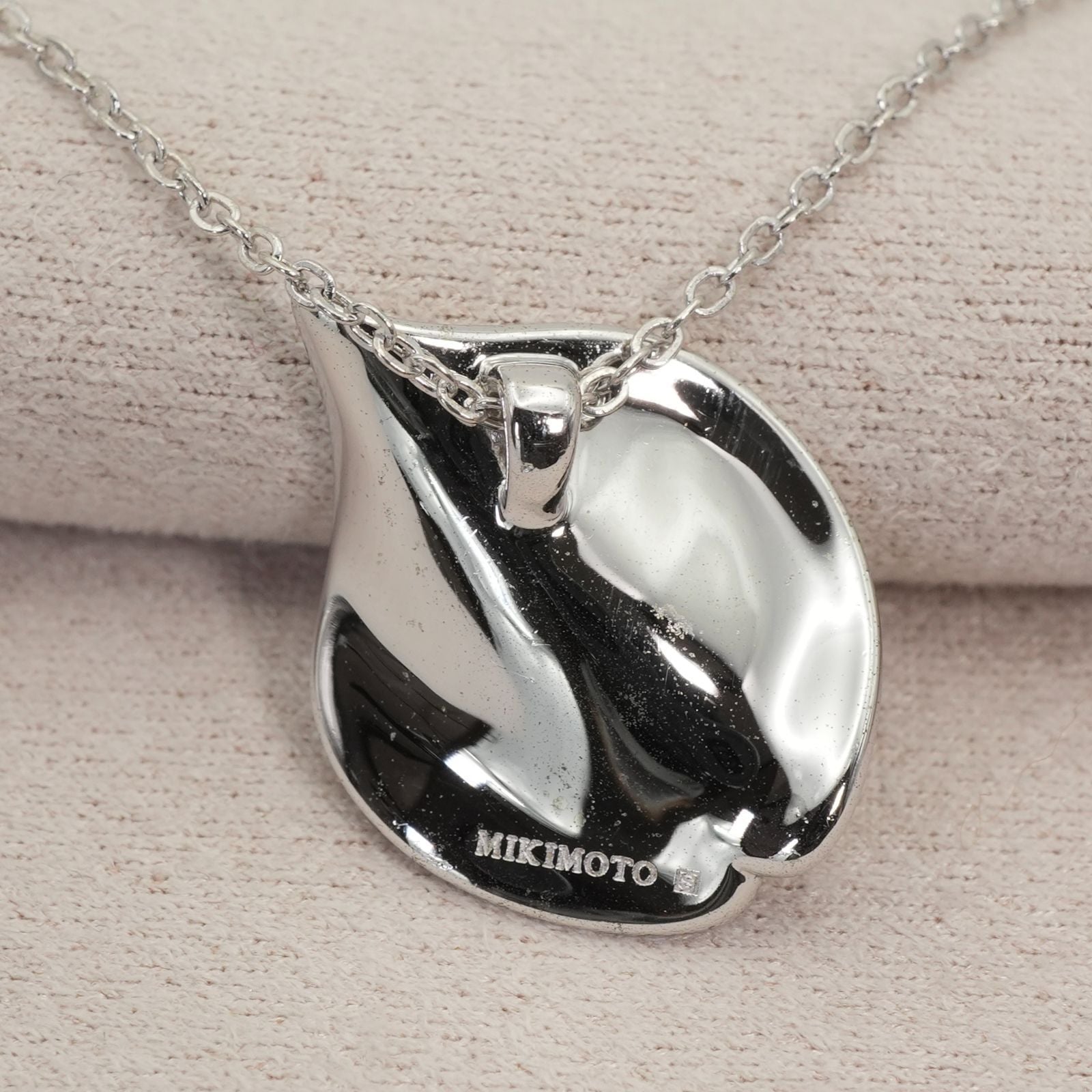 Mikimoto Petal Necklace featuring a Vandome silver pendant on a delicate chain