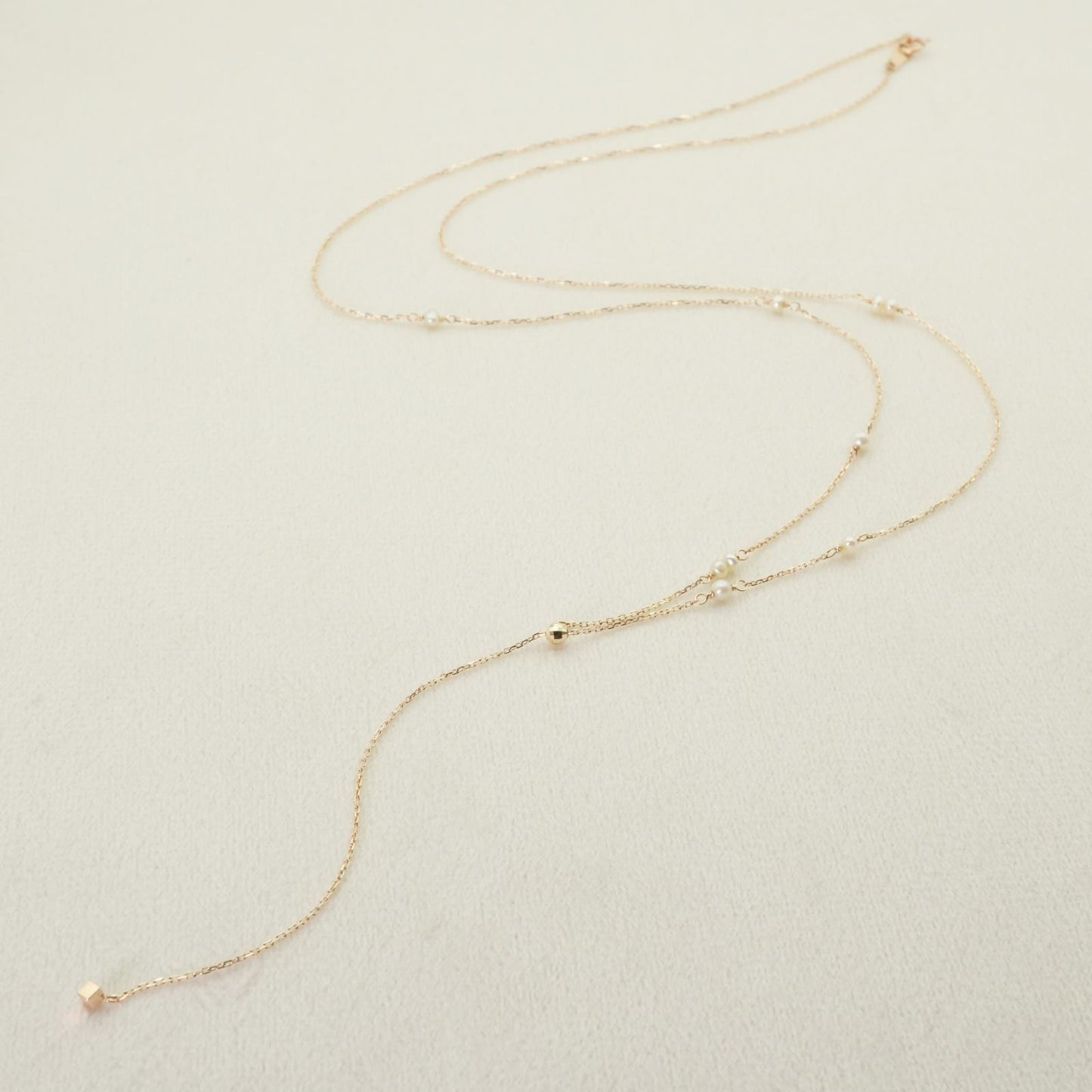 Agete Y-shaped long necklace made of K10 gold with freshwater pearls, clean and polished
