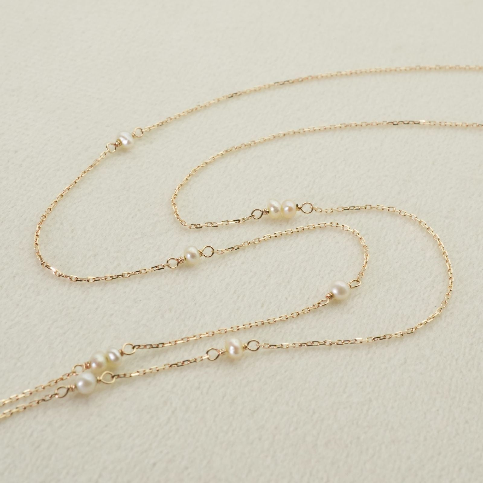 Agete Y-shaped long necklace made of K10 gold with freshwater pearls, clean and polished