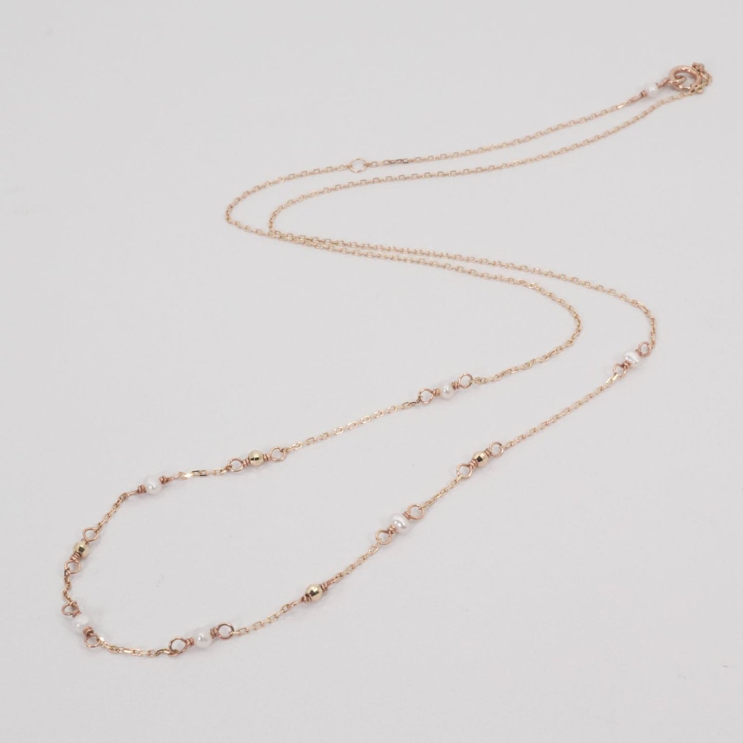 Agate K10 necklace featuring a freshwater pearl with a delicate chain model 26-0394