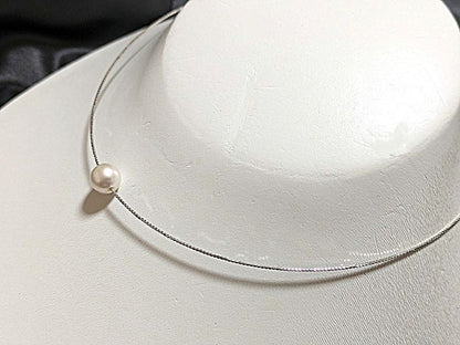 Akoya pearl Omega thread necklace with 9.5mm-9mm white slight pink round pearls and thick wrap