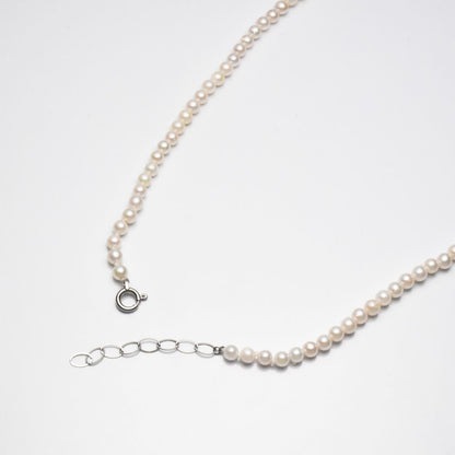Pt850 Akoya pearl necklace featuring 3-3.5mm pearls and a 42cm strand with platinum clasp