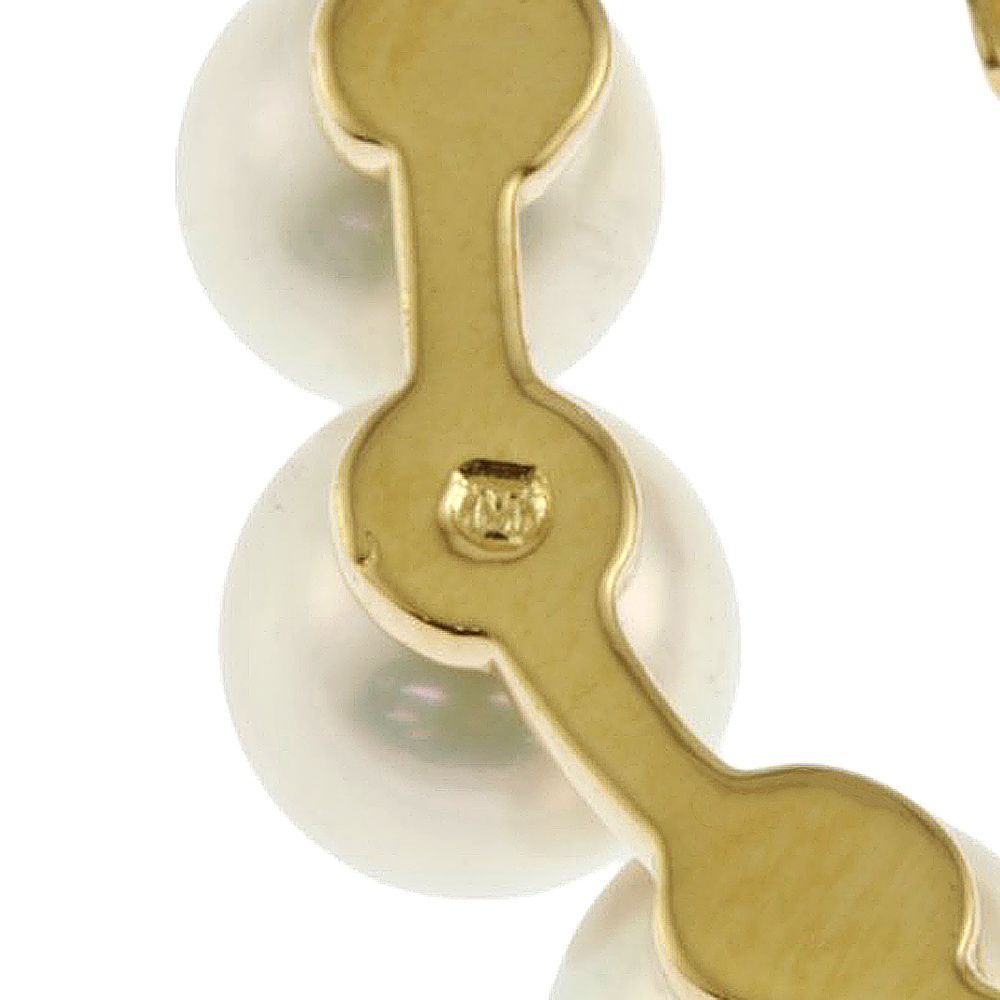 Mikimoto 18K yellow gold necklace featuring a single Akoya pearl and diamond accents for ladies