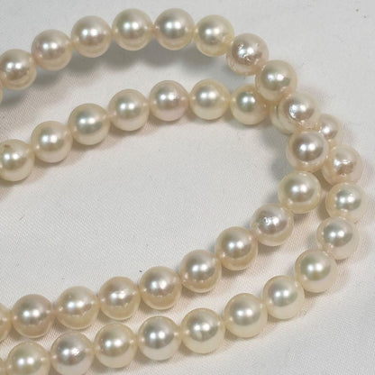 Akoya pearl long necklace with silver flower pendant, white pearls 6.5 to 7 mm, 82 cm length