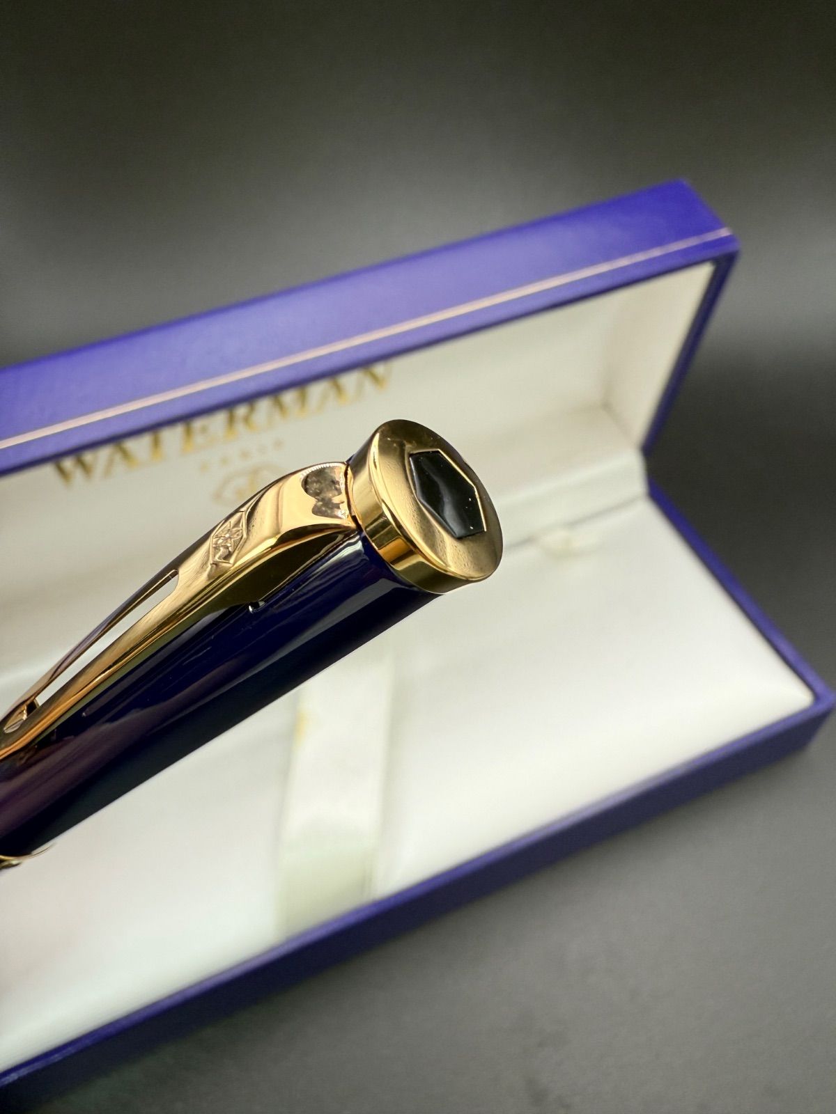 Waterman Preface ballpoint pen with blue romance design and hexagonal motif on cap, shown with case