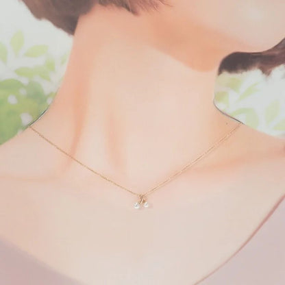 Akoya pearl pendant featuring a 4.1 to 5.1 mm pearl set in K18 pink gold with motif size 11.0 x 10.0 x 5.0 mm