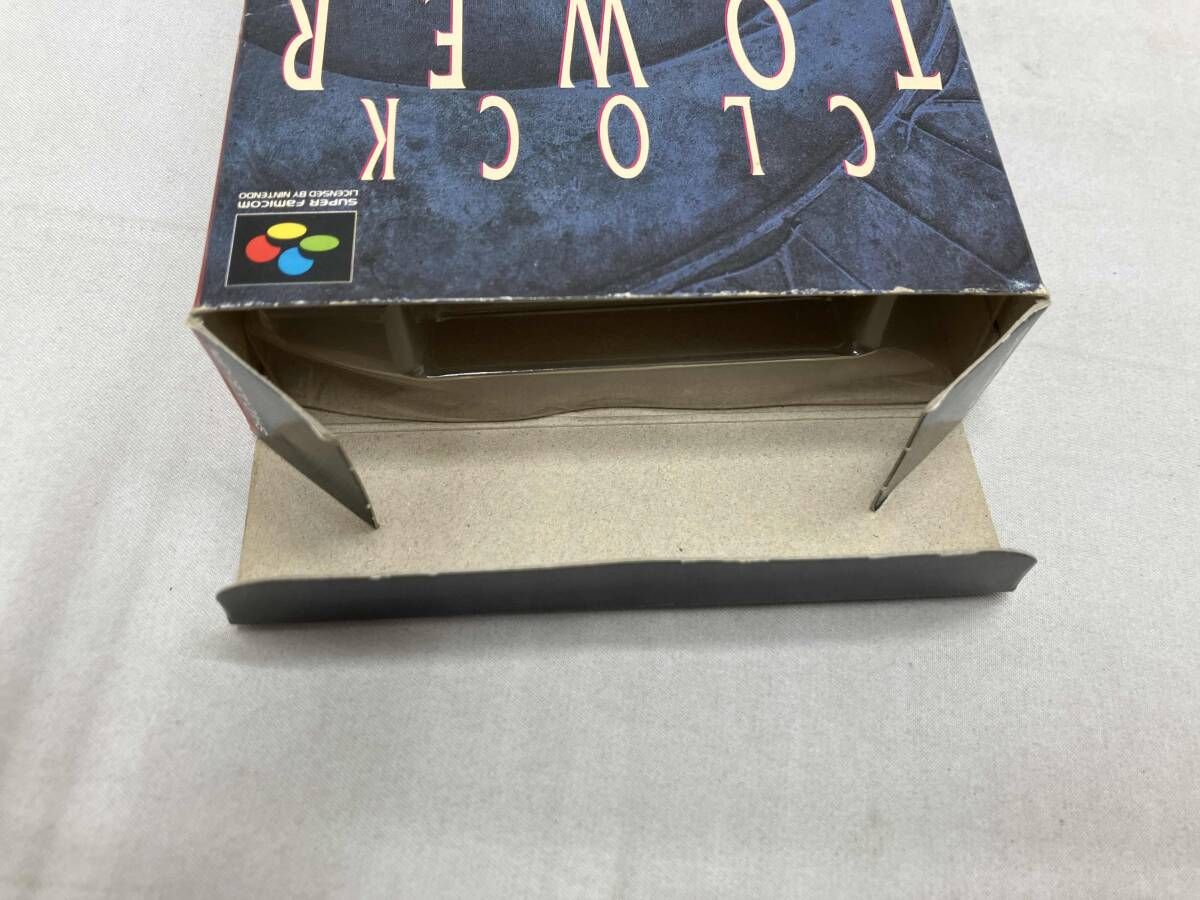 Clock Tower vintage game box and manual with crease on the back of the manual