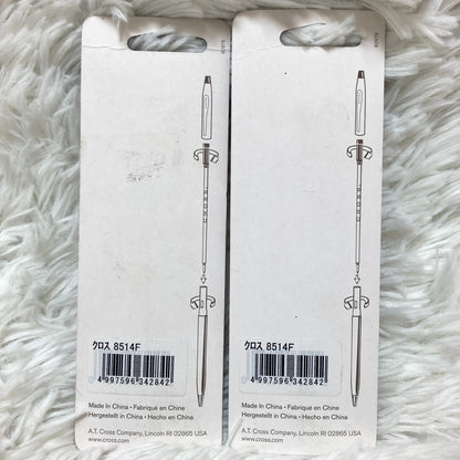Set of seven CROSS Kuro ballpoint pen refills in black and brown with model numbers 8513 and 8514
