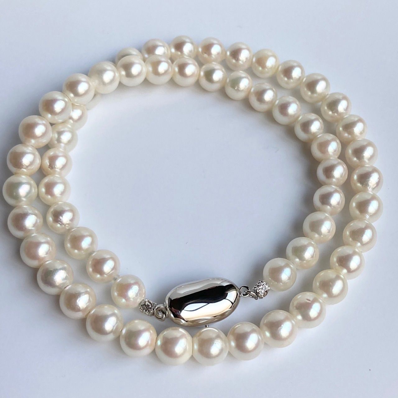Akoya pearl necklace 43cm with 6.5-7.0mm semi-round white pearls on silver chain