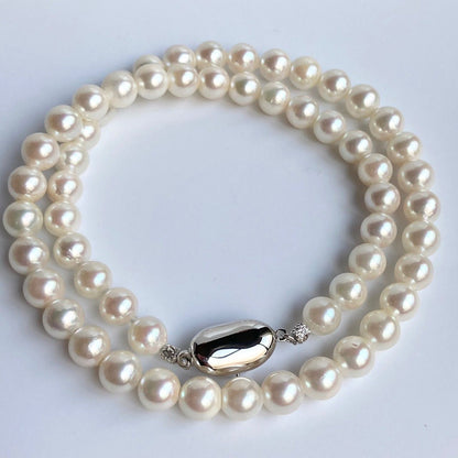Akoya pearl necklace 43cm with 6.5-7.0mm semi-round white pearls on silver chain