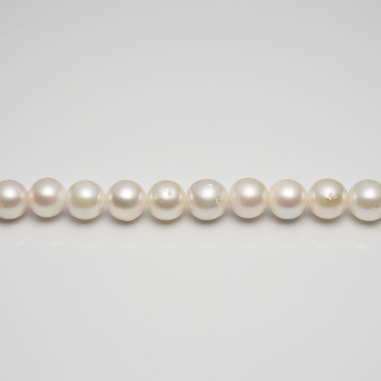 Akoya pearl necklace 8-8.5mm with dyed gray freshwater pearl necklace set displayed on white background